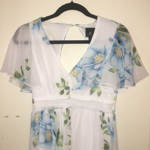 Adorable flirty romper/dress w/ open cut out back